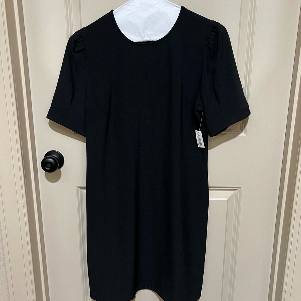 New little black dress! Approximately 32 3/4 inches from neckline to bottom.